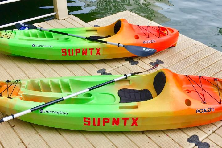 a small plane sitting on top of a wooden table