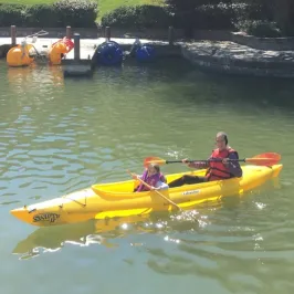 a small boat in a body of water