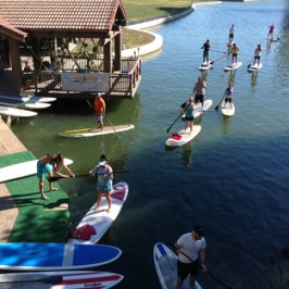 a group of people on a boat in the water